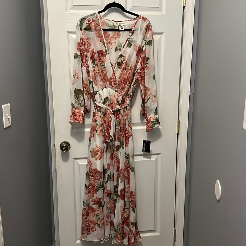 Cream and pink floral dress with sheer details.